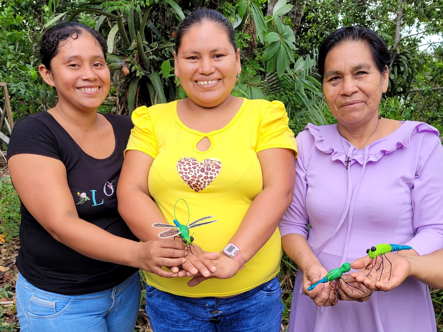 Artisan group with green darner dragonflies made at artisan facilitator training