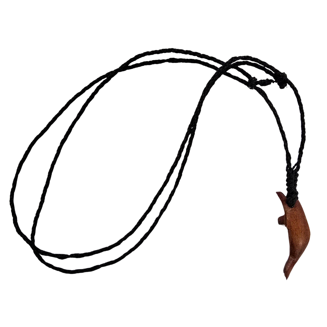 Carved tagua and palo sangre dolphin necklaces - made by artisans from the Peruvian Amazon