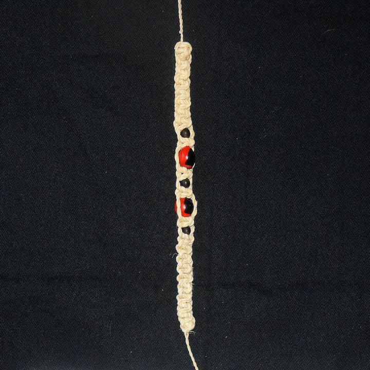 Huayruru and achira macrame bracelet - Amazon Ecology