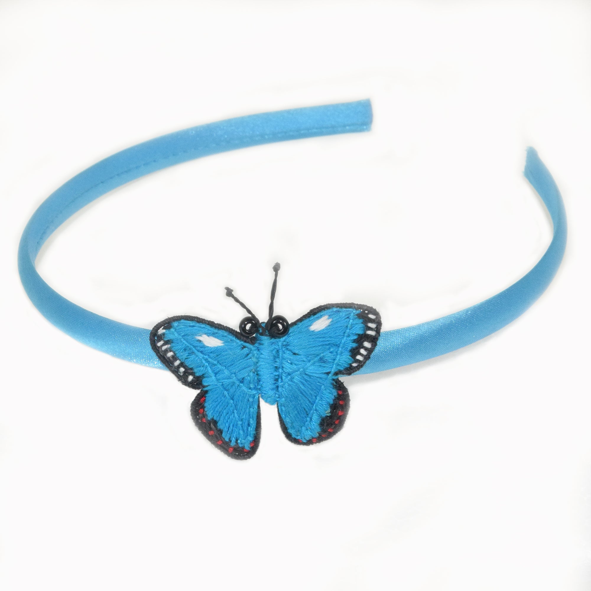 Woven butterfly headbands - Amazon Ecology