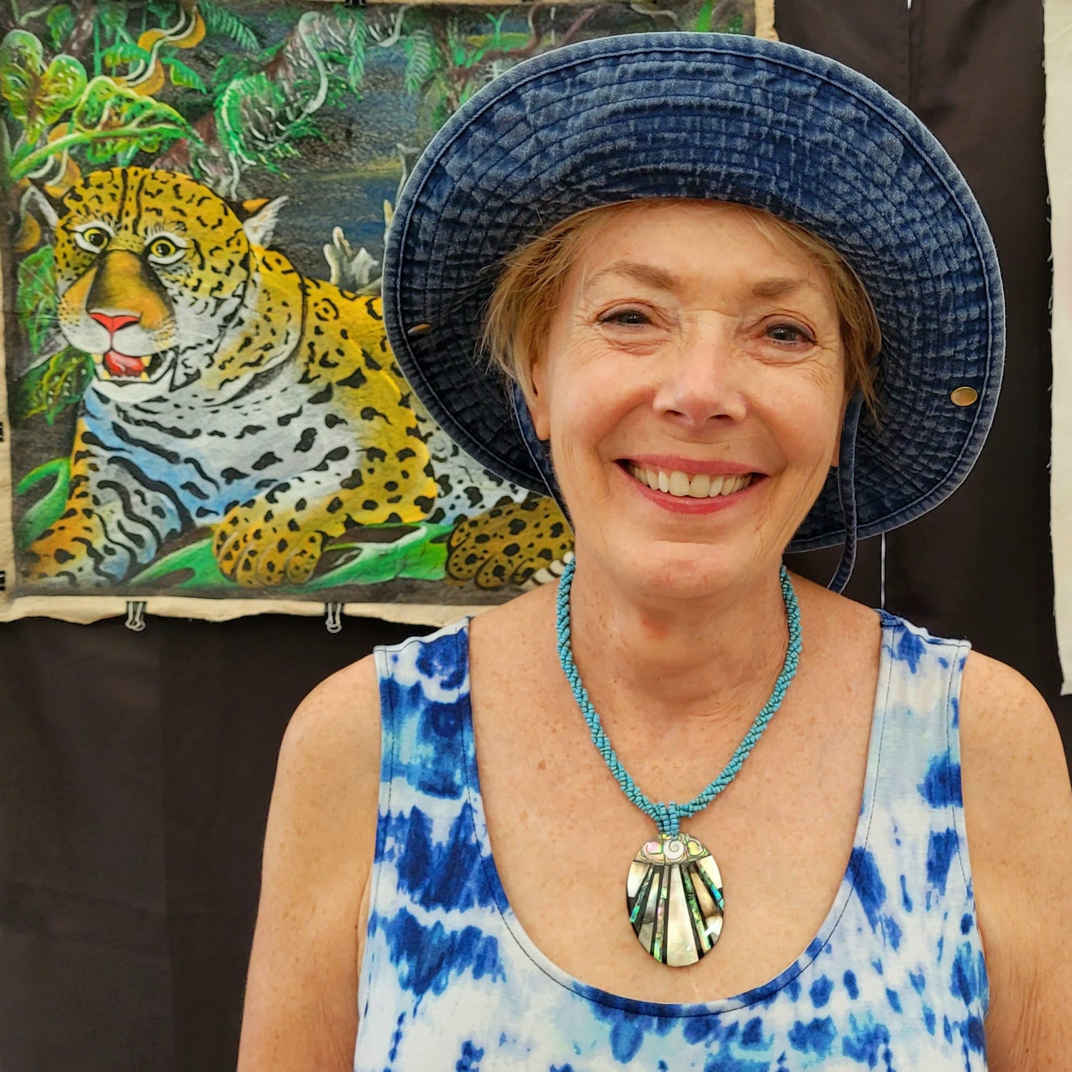 Woman with handmade butterfly barrettes made by artisans from the Peruvian Amazon