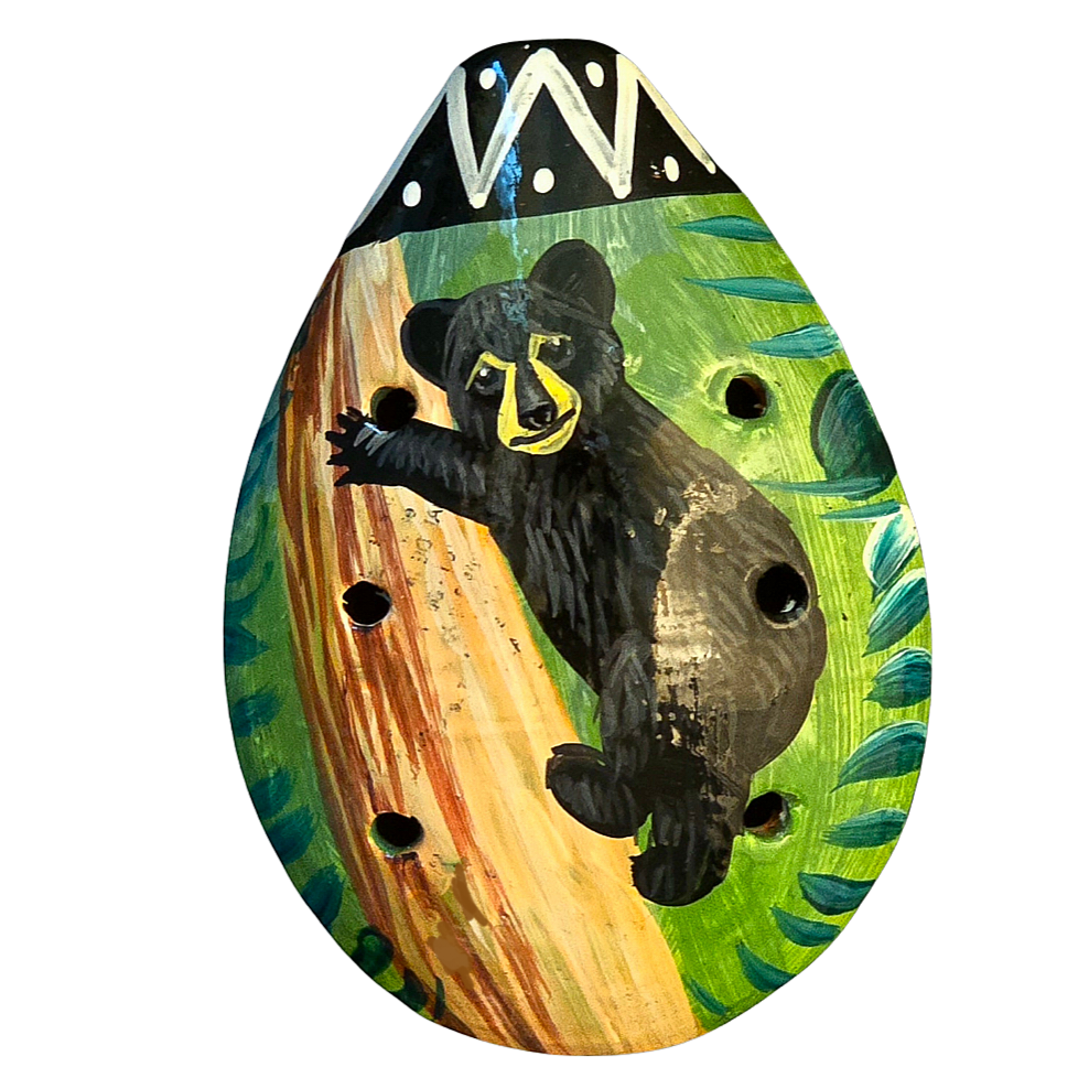 Ocarina ceramic whistle with painted wildlife figures - made by a Peruvian Amazon artisan