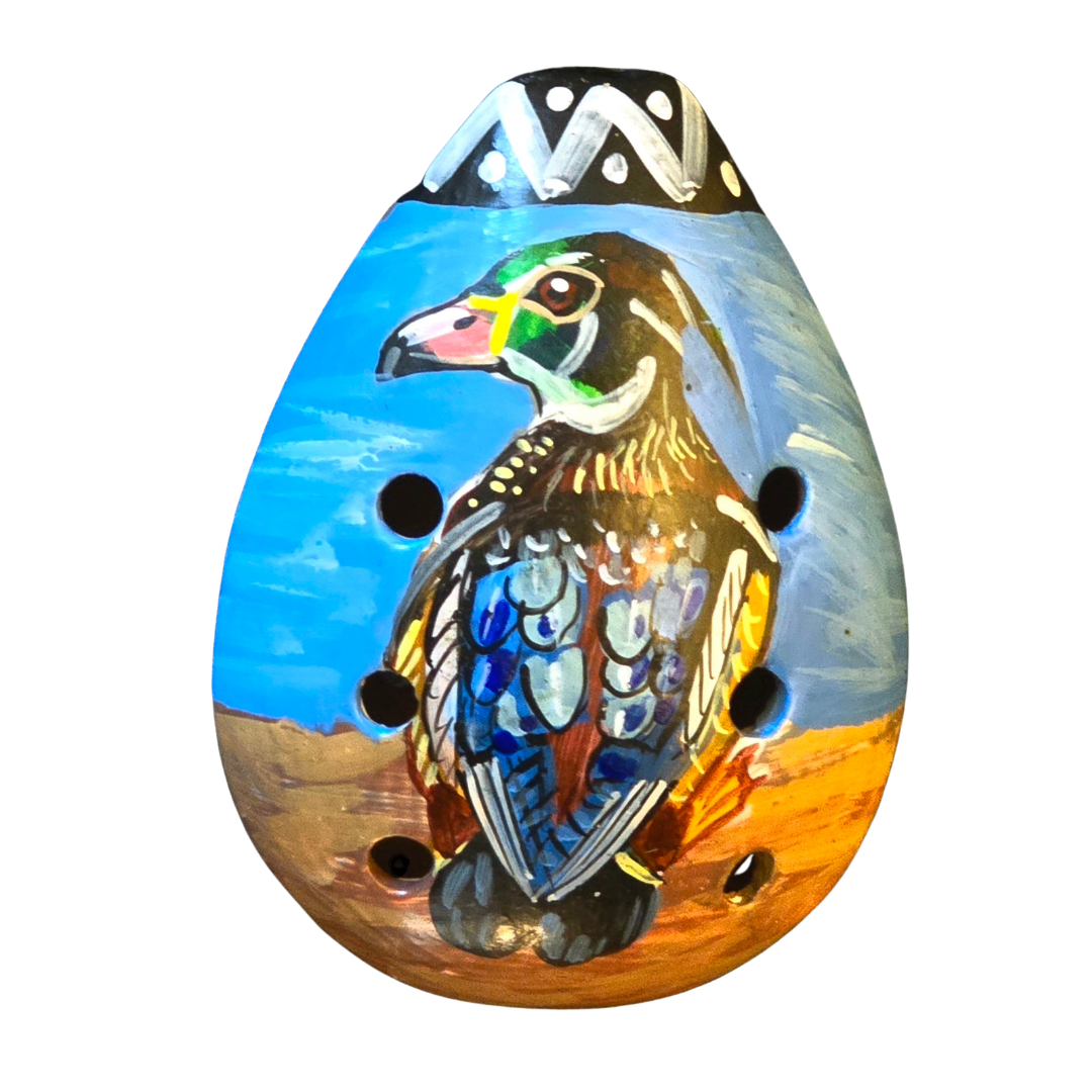 Ocarina ceramic whistle with painted wildlife figures - made by a Peruvian Amazon artisan