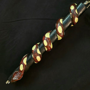 Wooden tropical snake on branch decoration - made by Peruvian Amazon artisan