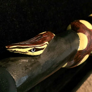 Wooden tropical snake on branch decoration - made by Peruvian Amazon artisan