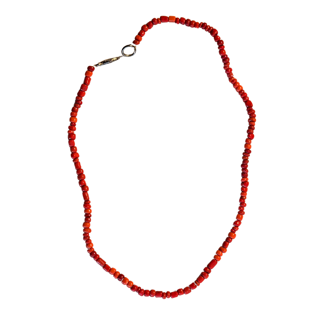 Coral colored bead necklace - made by artisan from the Peruvian Amazon