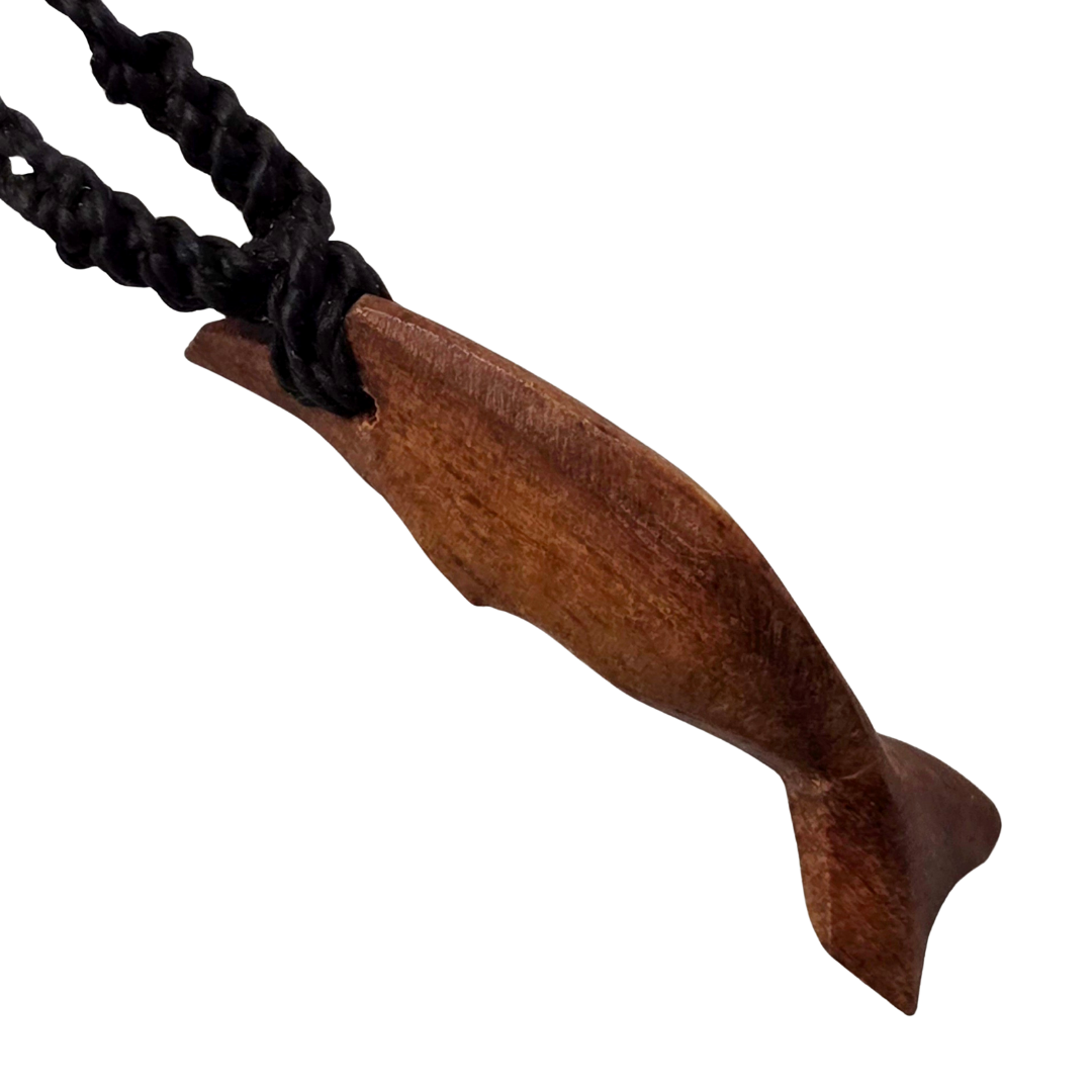 Carved tagua and palo sangre dolphin necklaces - made by artisans from the Peruvian Amazon