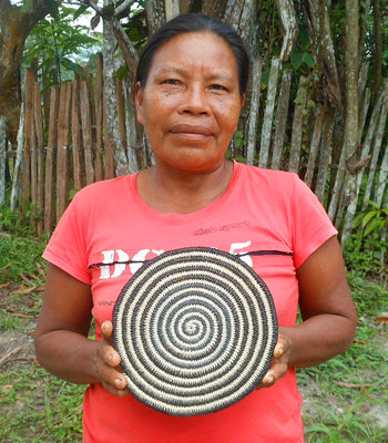 Woven hot pad (trivet) and center piece with black and white spirals