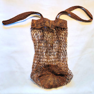 Two-handled round bottom fair trade chambira market bags made by Peruvian Amazon artisan