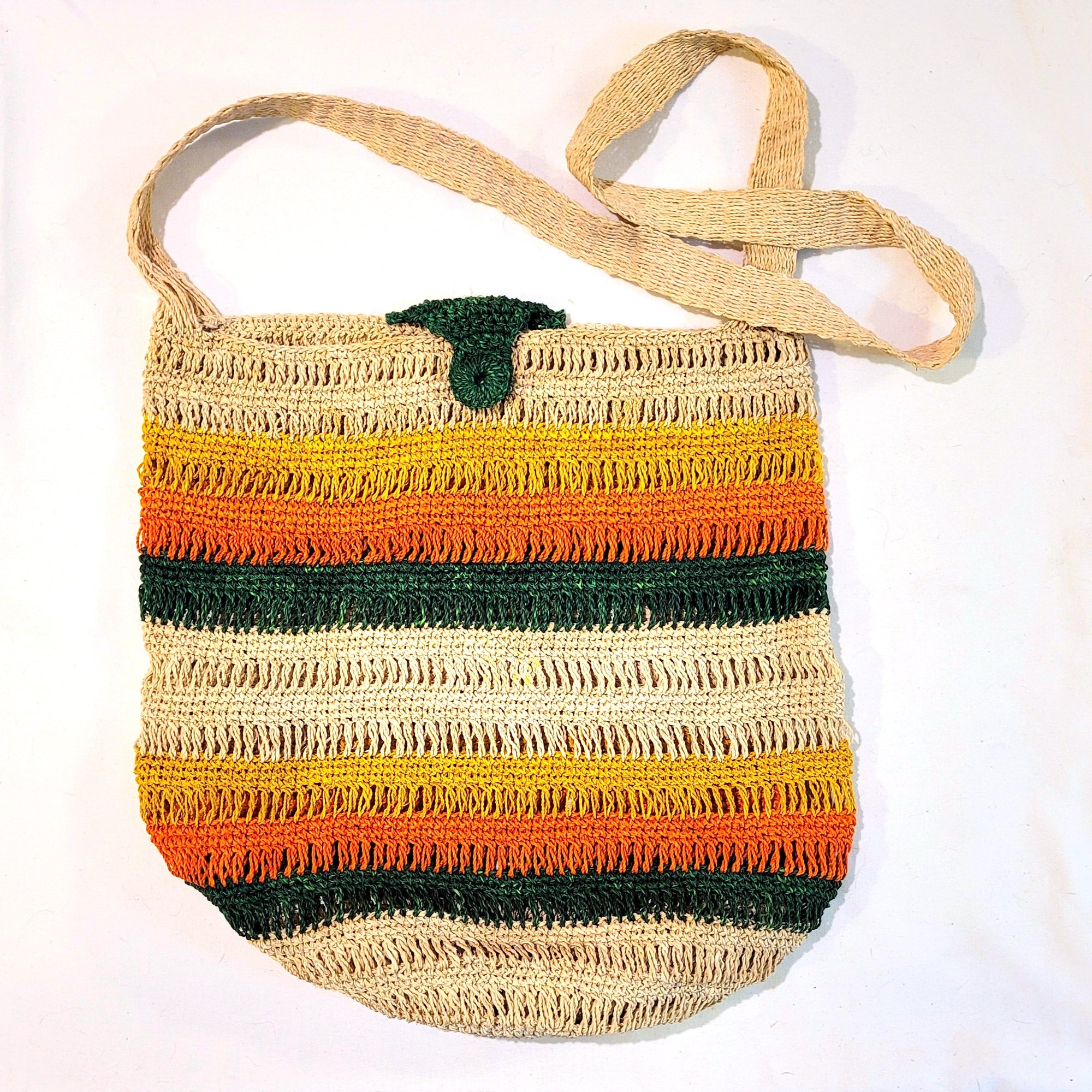 Hand made round bottom chambira fiber shoulder bag made by Peruvian Amazon artisan