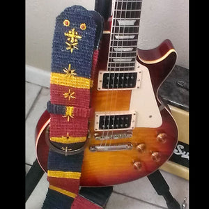 GSL02C: Capt. Dan guitar with wide Amazon Guitar Strap - coral snake model