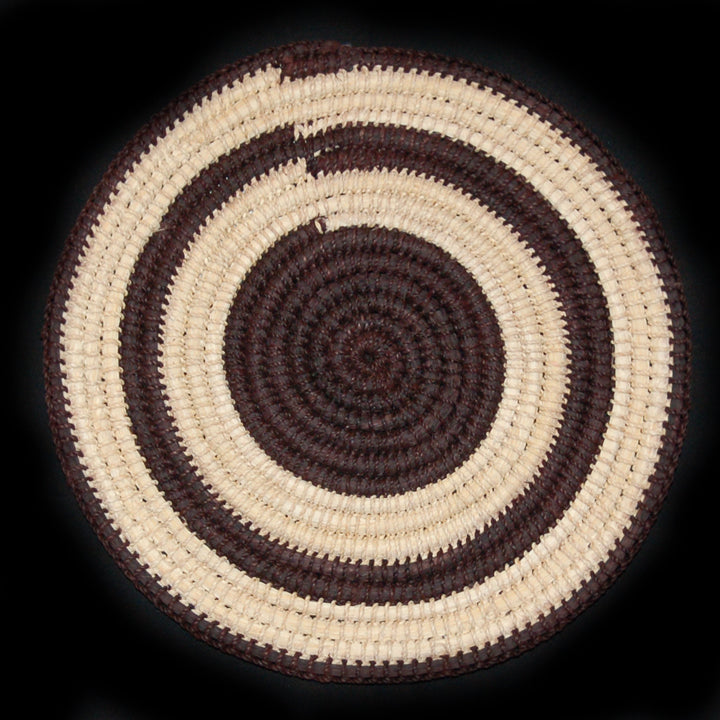 Woven hot pad (trivet) and center piece with black and white rings