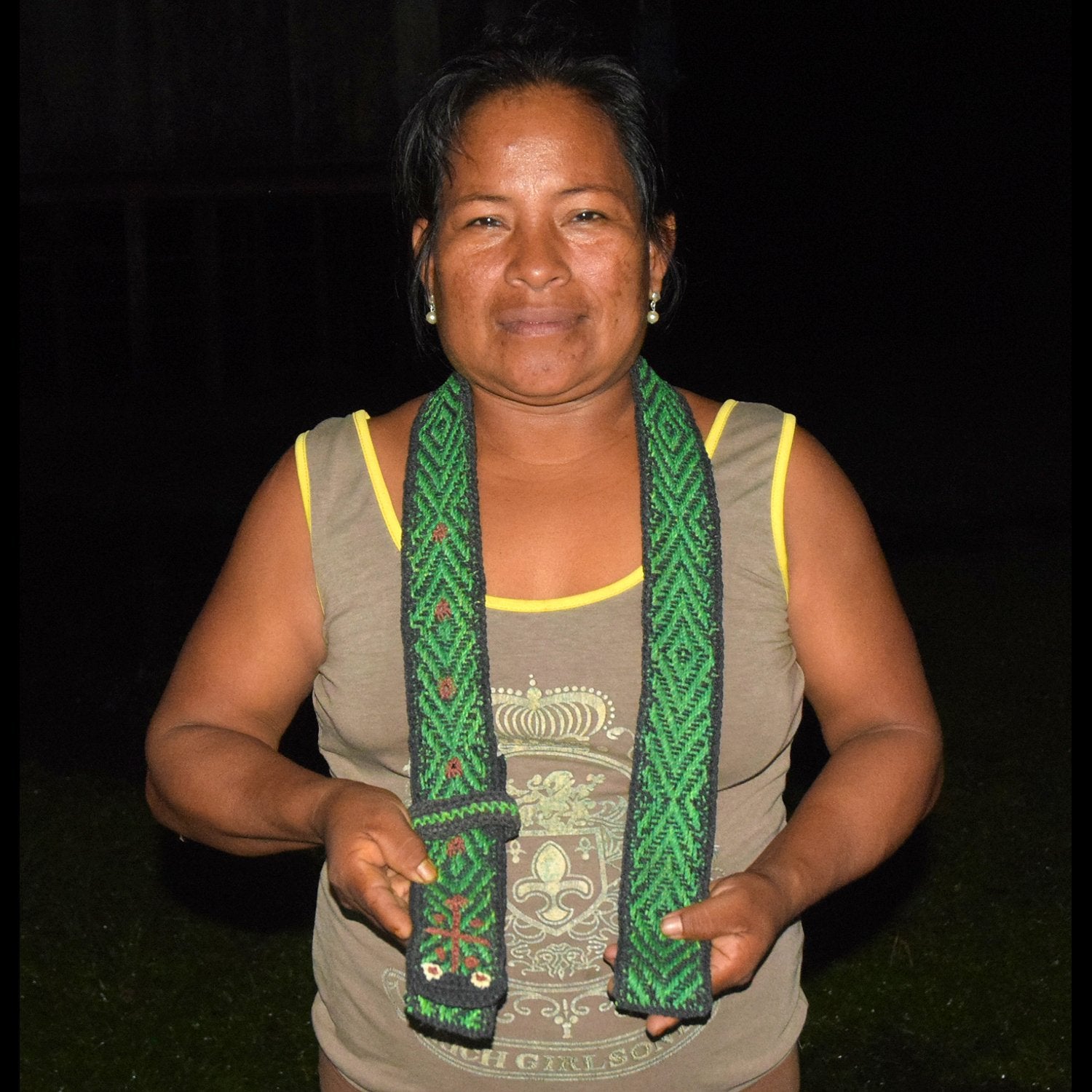 GS01C: Native artisan Monica Chichaco with Amazon green anaconda guitar strap -
